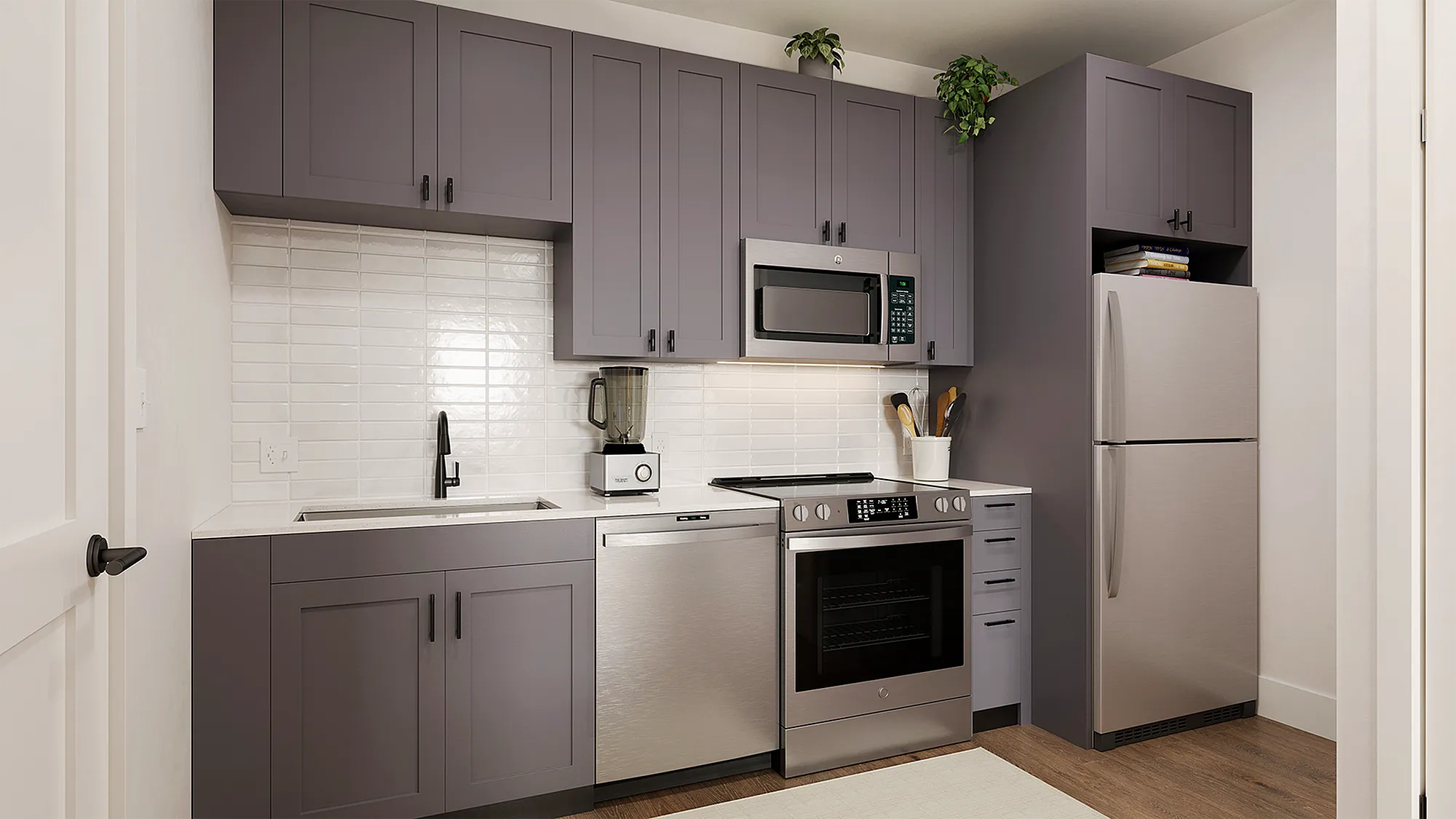 Modern kitchen with gray cabinets.